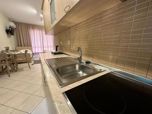 Virtuvė arba virtuvėlė apgyvendinimo įstaigoje Rias Seaside Apartments