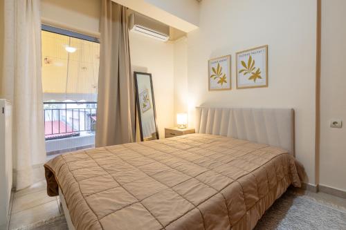 Ένα ή περισσότερα κρεβάτια σε δωμάτιο στο Cozy Family Apartment