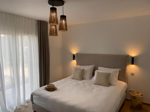 Postel nebo postele na pokoji v ubytování Villa Les Lentisques