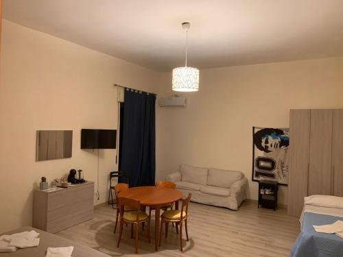 Et tv og/eller underholdning på Keira house Napoli