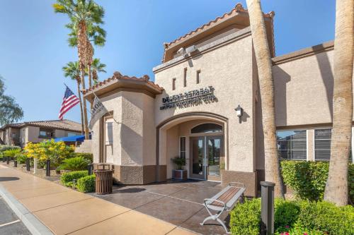 a building with a sign on the side of it at Hilton Vacation Club Desert Retreat Las Vegas in Las Vegas