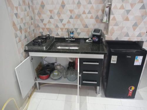 Una cocina o kitchenette en Loft Aconchegante no Centro de Niterói!!