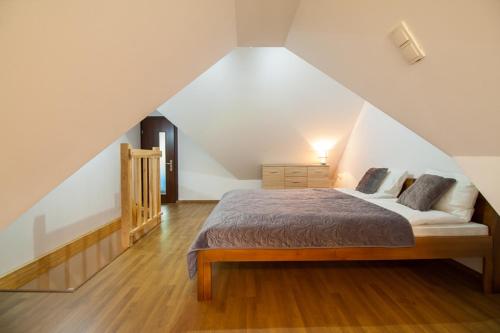 Postel nebo postele na pokoji v ubytování Pod Reglami