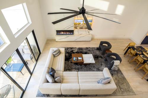 a living room with a couch and a table at Ellum House in Dallas