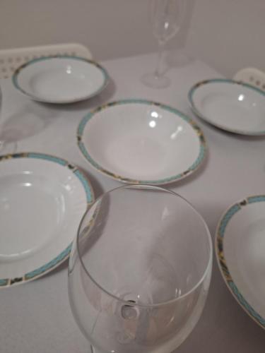 a group of empty wine glasses sitting on a table at RIVIJERA GREEN in Belgrade