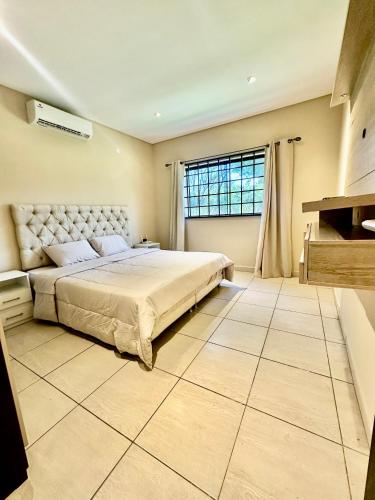 Postel nebo postele na pokoji v ubytování Villa Cielo Azul