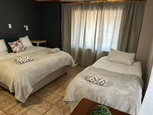 Postel nebo postele na pokoji v ubytování Namgate Guesthouse