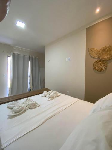 Posteľ alebo postele v izbe v ubytovaní Pousada Vibe Guajiru