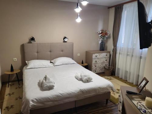 Postel nebo postele na pokoji v ubytování Къща за гости Донука