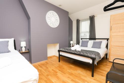 Luxe Retreat - Steps from Stadium - Pool Table, Ping Pong, Football Table photo 27