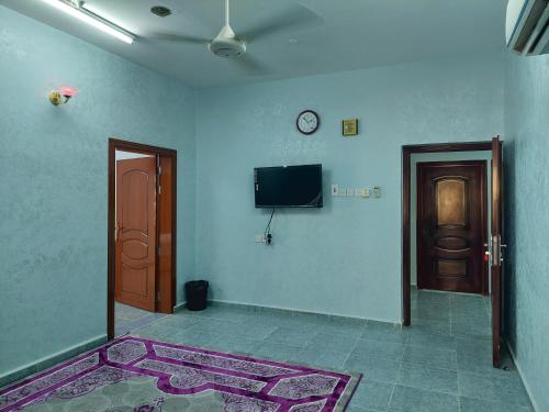 TV a/nebo společenská místnost v ubytování Hotel Ain Safnan Room&Flats فندق عين صفنان غرف&شقق