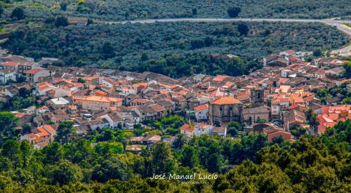 an aerial view of a town with orange roofs at AT la Abuela Antonia-El Gurugú in Torre de Don Miguel