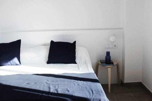 Postel nebo postele na pokoji v ubytování OD'A Apartaments