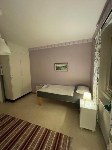 Un pat sau paturi într-o cameră la Lagfors128