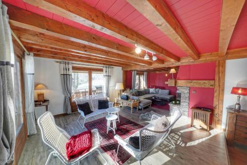 a living room filled with furniture and a fireplace at Pretty nest with view of Mont Blanc in Combloux