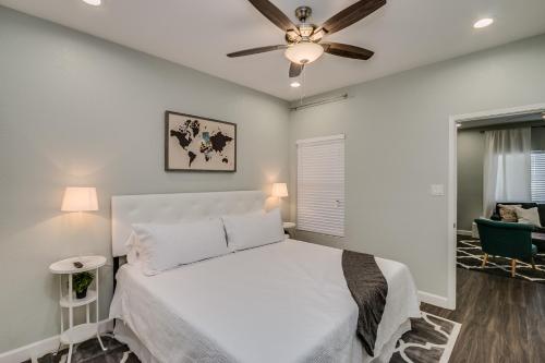a bedroom with a bed and a ceiling fan at Heated Community Pool-Quiet Community-Top Flr Unit in Mesa