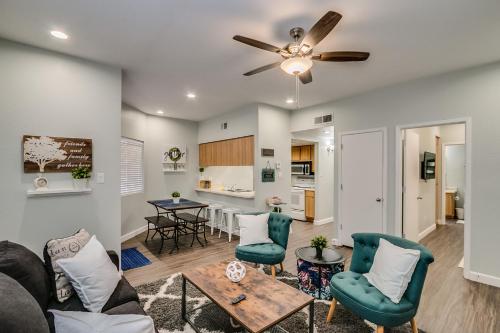a living room with a couch and chairs and a table at Heated Community Pool-Quiet Community-Top Flr Unit in Mesa