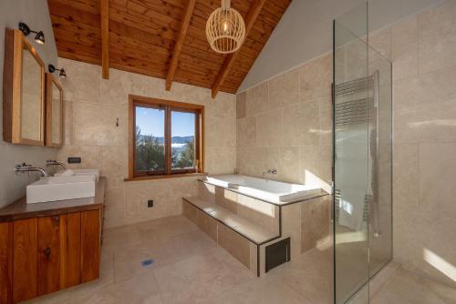 a bathroom with a sink and a shower at Lake Hawea View in Albert Town
