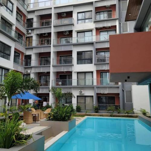בריכת השחייה שנמצאת ב-Oceanview Apartment Escape או באזור