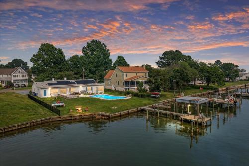 an aerial view of a house on the water at Waterfront Bliss- Ultimate Tilghman Retreat home in Tilghman
