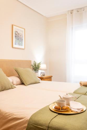 Ένα ή περισσότερα κρεβάτια σε δωμάτιο στο Apartamento Baztangoa II