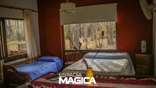 Vuode tai vuoteita majoituspaikassa Cabañas en Malargue