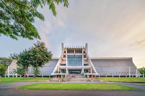 an office building with a pyramid facade at Gachilly House - Your Cozy Home In The Heart Of The BMT City in Buon Ma Thuot