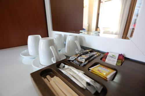 a tray with utensils on a table in a bathroom at Arven Hotel in Istanbul