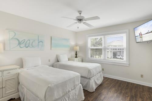 Postel nebo postele na pokoji v ubytování Boaters Dream House On Holiday Isle