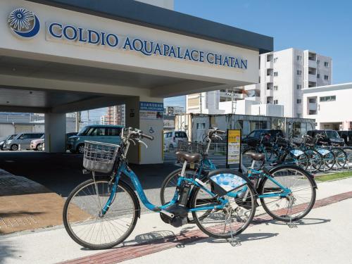a group of bikes parked in front of a dealer at Aqua Palace Chatan by Coldio Premium in Chatan
