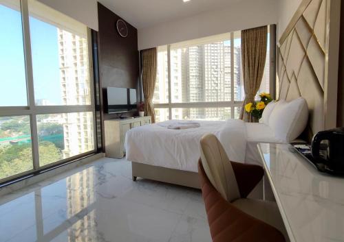 Voodi või voodid majutusasutuse Premium Apartment in Hiranandani Powai by Maxxvalue - Chitranjan toas