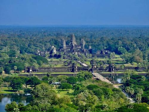 an aerial view of a temple complex with a lake at NLCO Homestay in Siem Reap