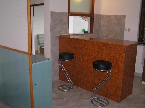 A kitchen or kitchenette at Apartments Villa Ypsilon