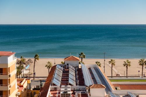 Beachfront apartment with panoramic sea views, private parking, swimming pools and mini golf
