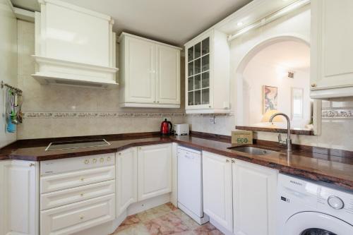 Beachfront apartment with panoramic sea views, private parking, swimming pools and mini golf