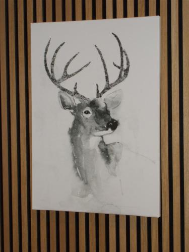 a drawing of a deer with antlers in a picture at Gasthof Ramsauer in Neufahrn in Niederbayern