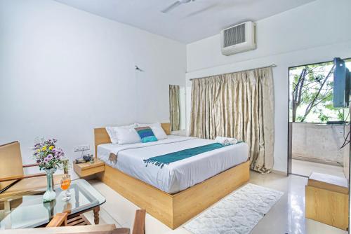Ένα ή περισσότερα κρεβάτια σε δωμάτιο στο Hotel Saikrupa