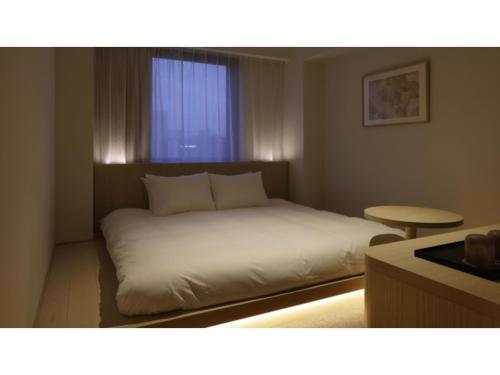 Ліжко або ліжка в номері SOKI KANAZAWA - Vacation STAY 40255v