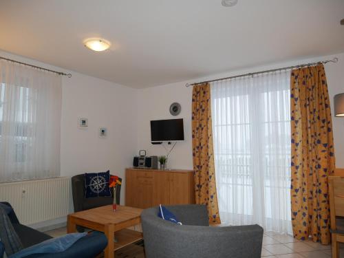 TV a/nebo společenská místnost v ubytování Villa Maria-Gabriele Whg 01 Kölpinsee Usedom