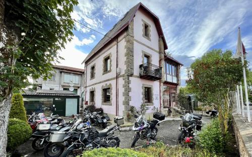 a group of motorcycles parked in front of a building at Posada Villa Rosa in Reinosa