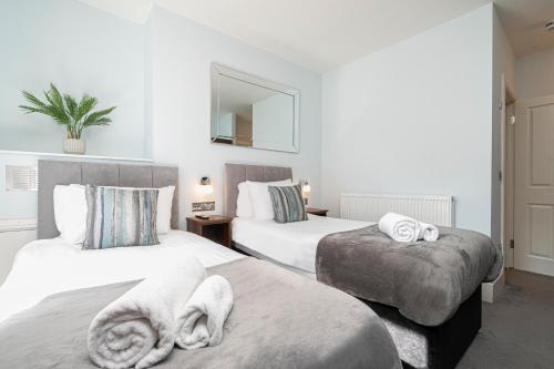 Ένα ή περισσότερα κρεβάτια σε δωμάτιο στο Ocean Stays - Boutique Hotel on Plymouth Hoe