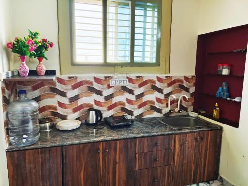 A kitchen or kitchenette at Mannat Inn (Peace Homestay)