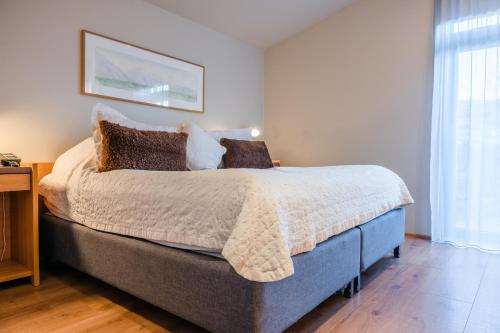 Cama o camas de una habitación en Hótel Húsafell