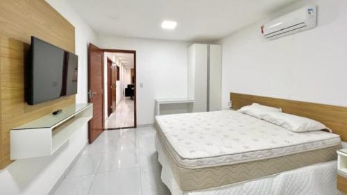 Katil atau katil-katil dalam bilik di Casa Macao Tibau do Sul
