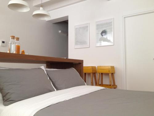 a bedroom with a bed with a wooden headboard at 2409 parma in Parma