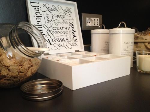 a white box sitting on a table with some food at 2409 parma in Parma