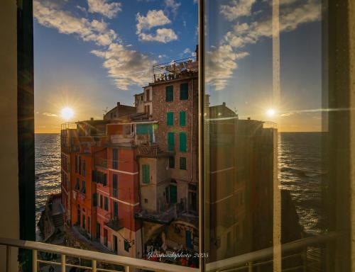 a view of a building from a window at Alla Marina Affittacamere in Riomaggiore