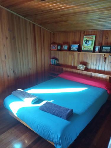 Postel nebo postele na pokoji v ubytování Casa de Madera