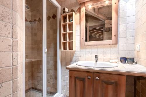 a bathroom with a sink and a shower at Les Cristalliers - Cozy family chalet - Close to the village in Les Houches