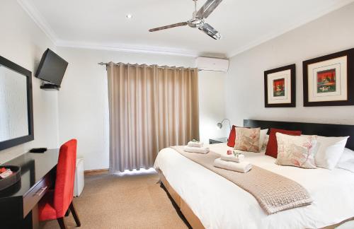 Letto o letti in una camera di The Wild Olive Guest House